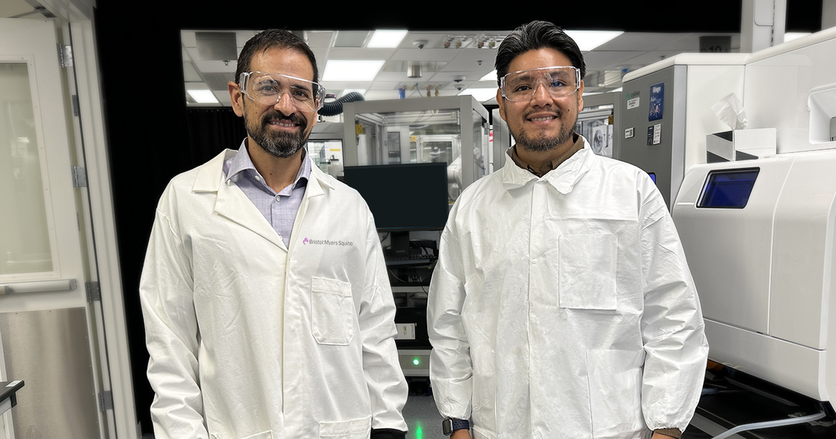 Photo of Francisco and Noe in a Bristol Myers Squibb lab