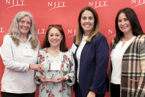 BMS employees accepting award from NJIT