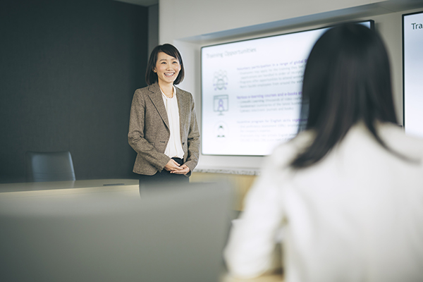 Photo of woman giving presentation