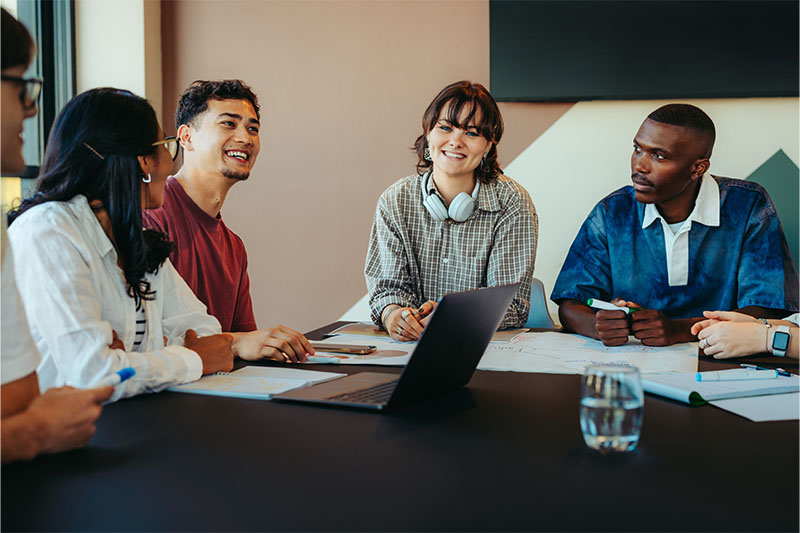 interns sitting in a conference room